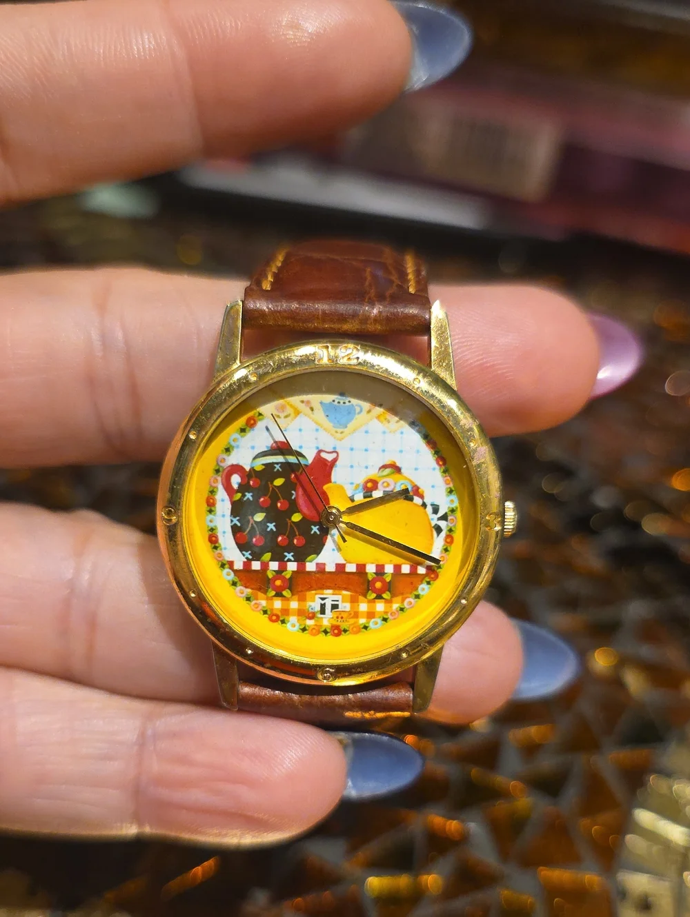 Vintage Gold-Tone Watch with Brown Leather Strap and Yellow Dial